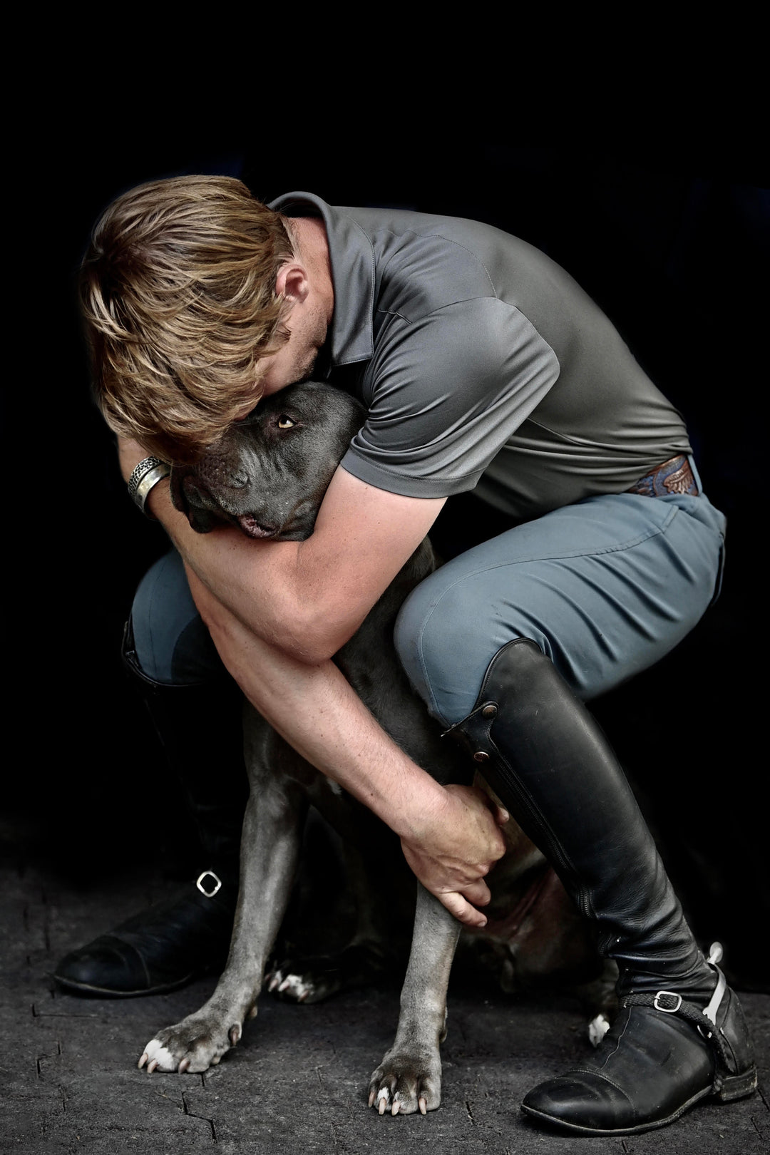 Karl Cook hugging his dog Blueberry – Heartwarming moment between the Olympic equestrian rider and his beloved pet.