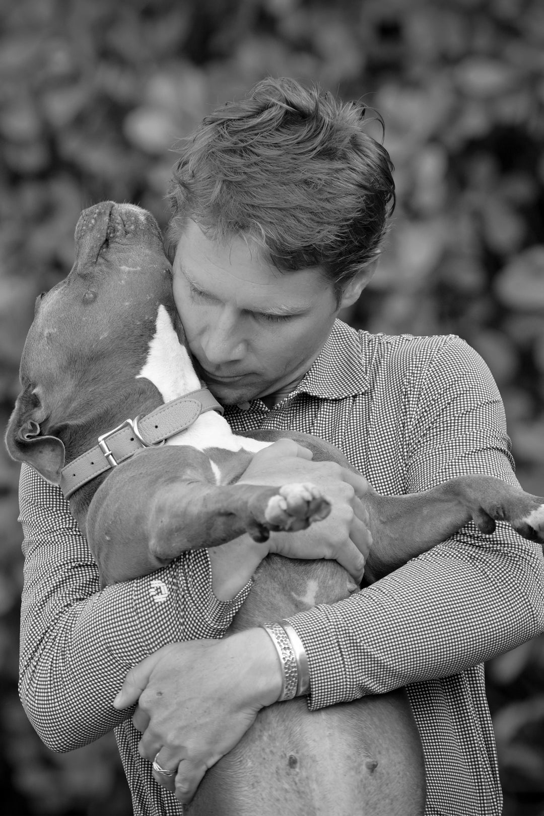 Karl Cook and his dog, Banana, enjoying a moment together.