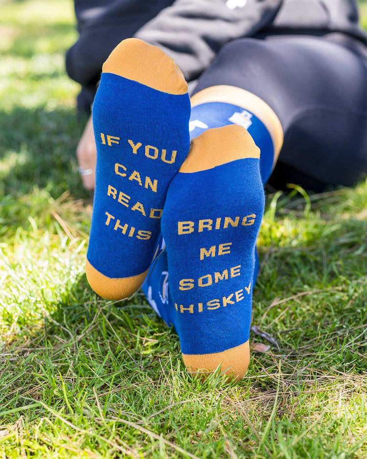 Blue Socks featuring Walking & Talking logo, whiskey glasses, and “If you can read this, bring me another whiskey” text.